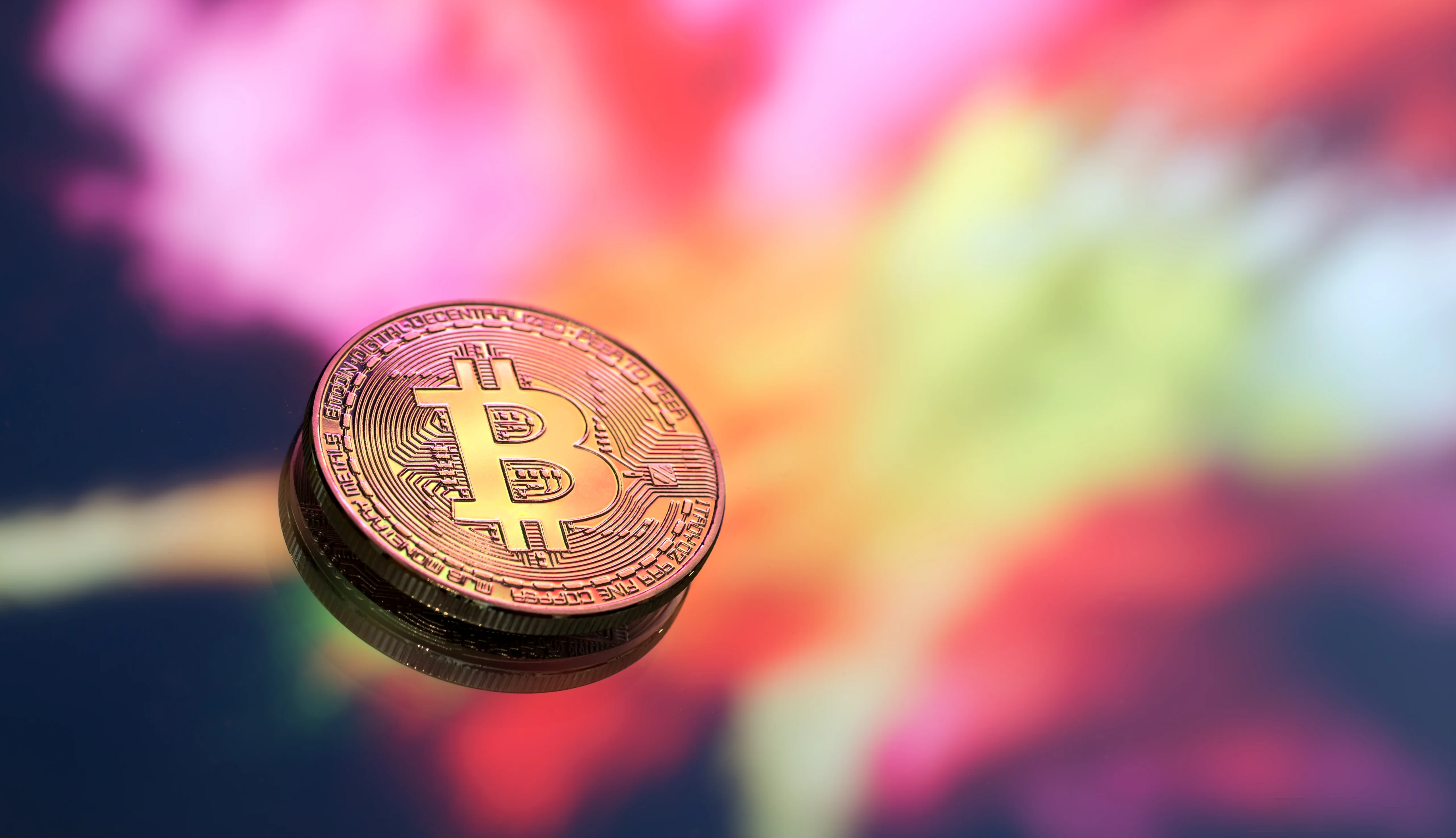 bitcoin-is-new-concept-virtual-money-colorful-background-coin-with-image-letter-b-close-up.webp