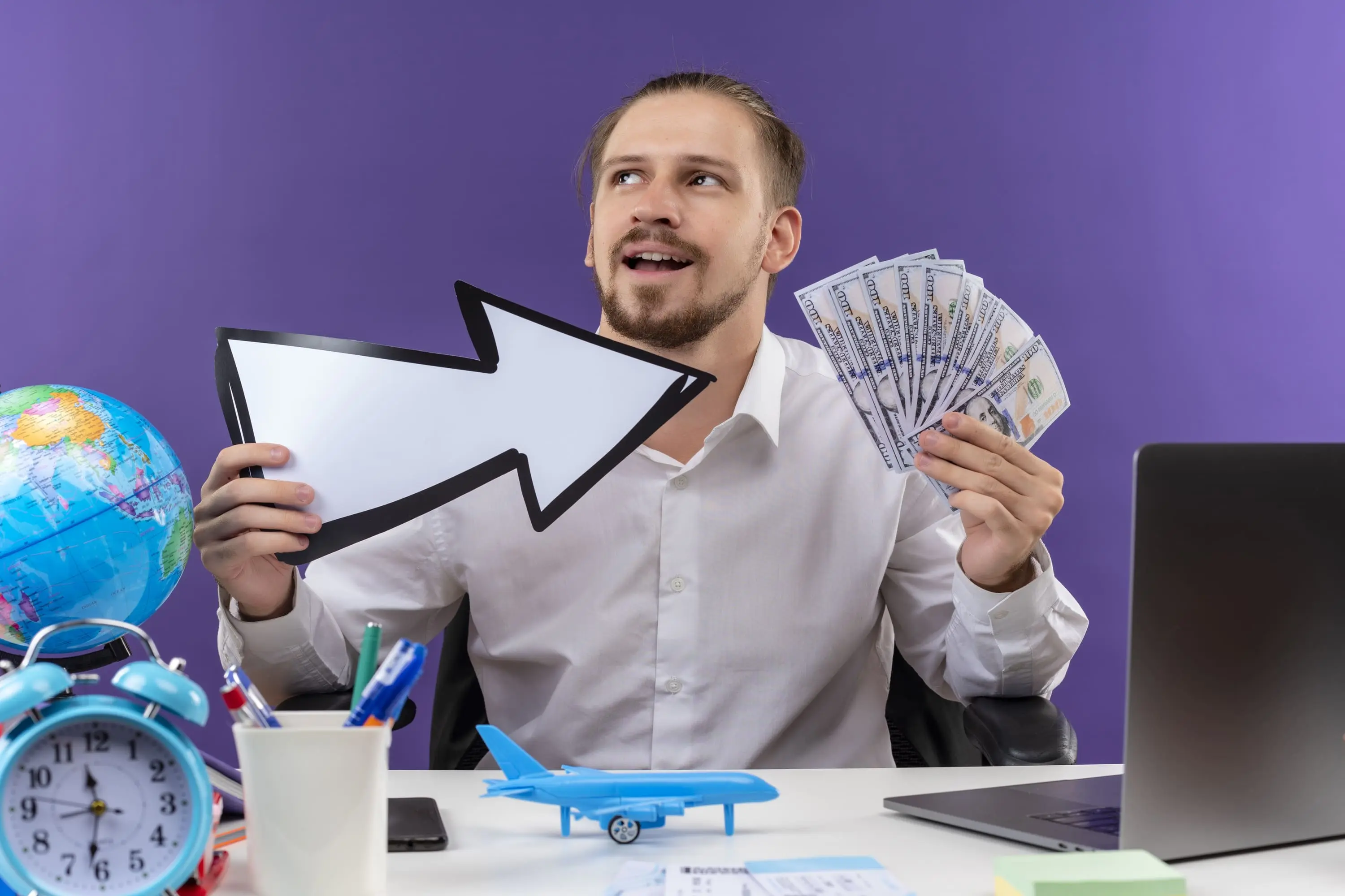 handsome-businessman-white-shirt-holding-white-arrow-showing-cash-looking-aside-with-smile-fa...webp